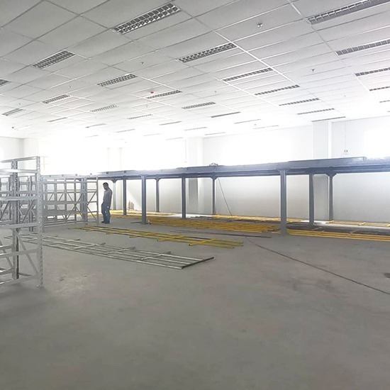 รับต่อเติมชั้นลอยสินค้าในโกดังและชั้นลอยอเนกประสงค์ (Mezzanine Floor) - ชั้นลอยน็อคดาวน์ - ยูนิคอร์น พลาสเนอร์ (6395)